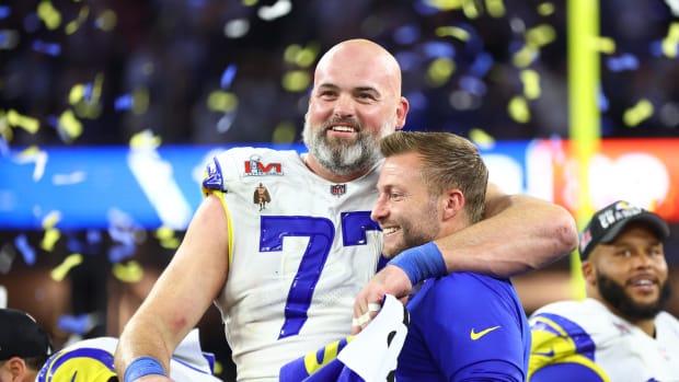 Feb 13, 2022; Inglewood, CA, USA; Los Angeles Rams head coach Sean McVay and offensive tackle Andrew Whitworth (77) celebrate after defeating the Cincinnati Bengals in Super Bowl LVI at SoFi Stadium. Mandatory Credit: Mark J. Rebilas-USA TODAY Sports